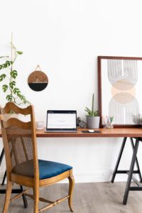 a clean and modern desk set up in a natural light studio