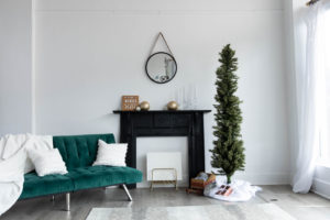 a simple holiday set in a natural light photography studio